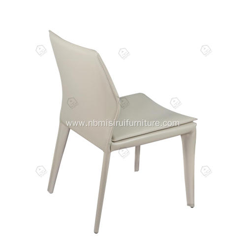 White saddle leather armless dining chairs